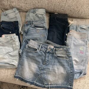8 pairs of girl shorts and 1 jean skirt size 10/12
